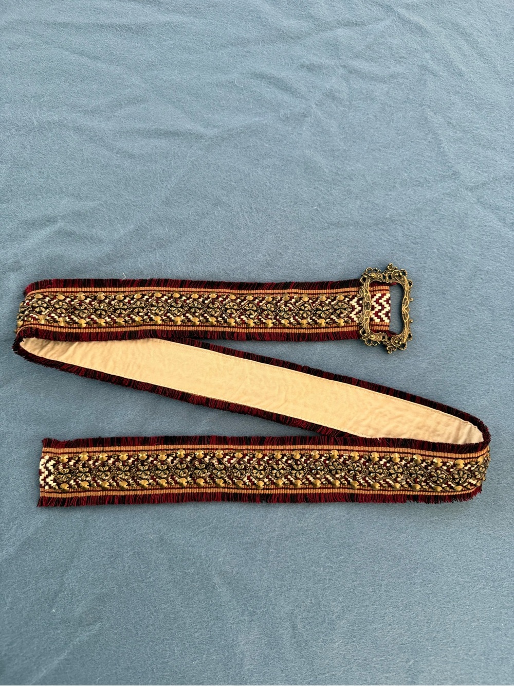 POL embroidered fringe belt